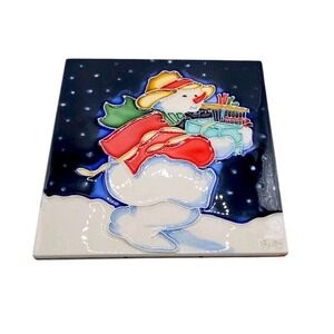 Ping 6" X 6" Christmas Snowman Carrying Gifts Ceramic Tile Trivet By Mary Parker